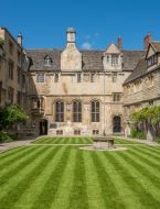 Image across manicured lawn of the front quad at St Edmund Hall