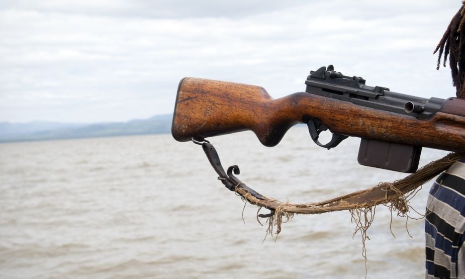  Weapon on man's shoulder at Lake Chamo, Ethiopia. Credit: Joel Carillet, Getty Images