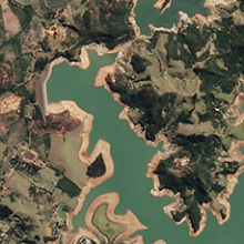 The Jaguari Reservoir in Brazil. The left side image shows the area on August 3, 2014; the right side image shows the same area on August 16, 2013, before the recent drought began. Credit: NASA.
