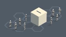 Illustration of a ballot box surrounded by robots. Credit: mathiswork, Getty Images