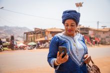 Woman in Africa using mobile phone. Credit: Media Lens King, Getty Images