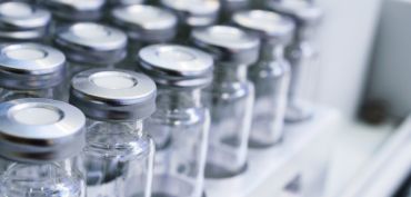 Photo | Vaccine vials on a shelf