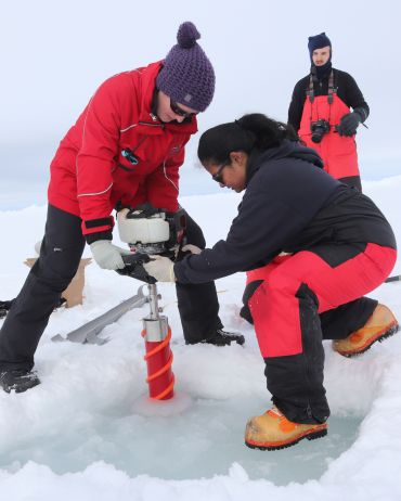 Scientists on the Weddell Sea Expedition taking ice core samples. Image credit: Nekton 2022.