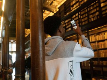 An Astrophoria student touring the inside of the Bodleian