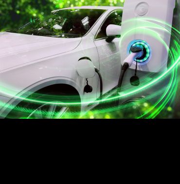 An artistic image of an electric vehicle plugged into a charging point. Image credit: Shutterstock.