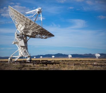 A giant antenna dish, part of the Karl G. Jansky Very Large Array radio telescope. Image credit: Shutterstock.  