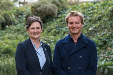 Head and shoulders image of Nico Rosberg with the Vice-Chancellor of the University of Oxford