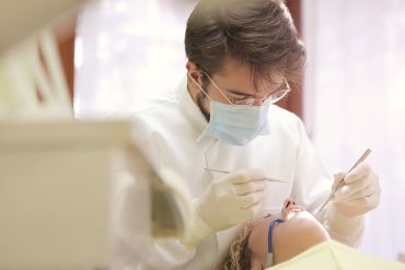 dentist working on a young women