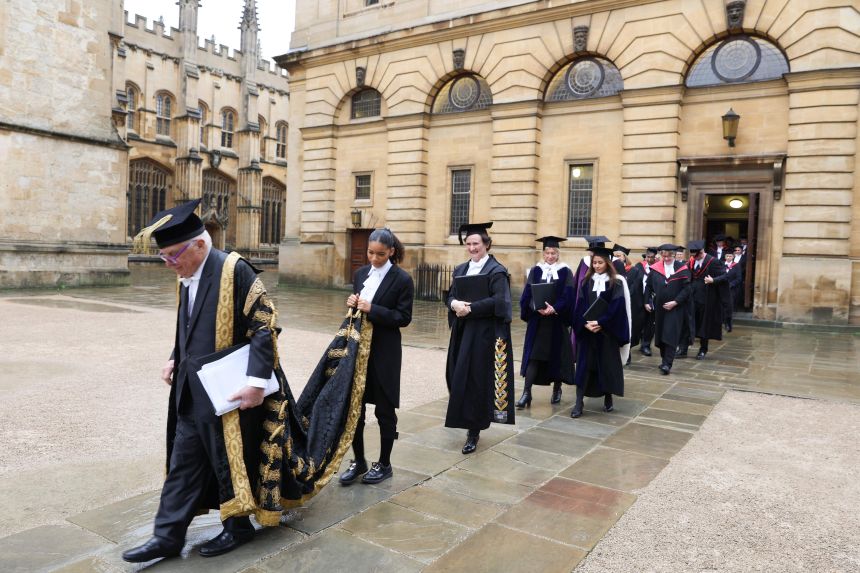 Lord Patten leads a procession after the ceremony; Professor Irene Tracey is third from left - Picture by Cyrus Mower