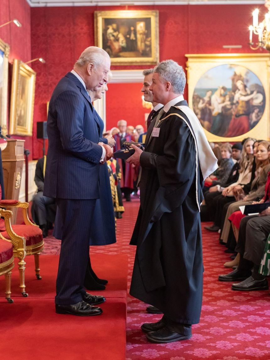 Professor Ben Goldacre and Professor Seb Bacon receive the Queen Elizabeth Prize from the King and Queen.