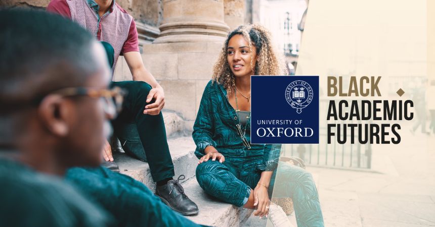 Black Academic Futures scholars sitting on steps outside a University building in Oxford