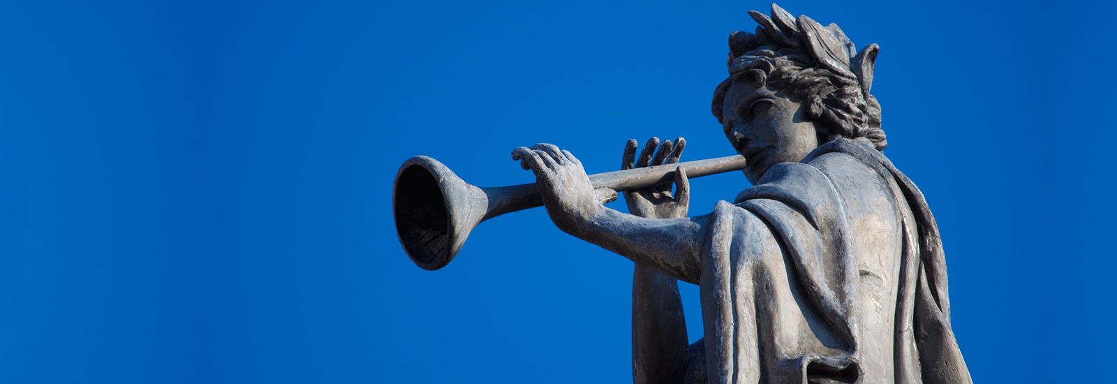 Muse atop the Clarendon Building