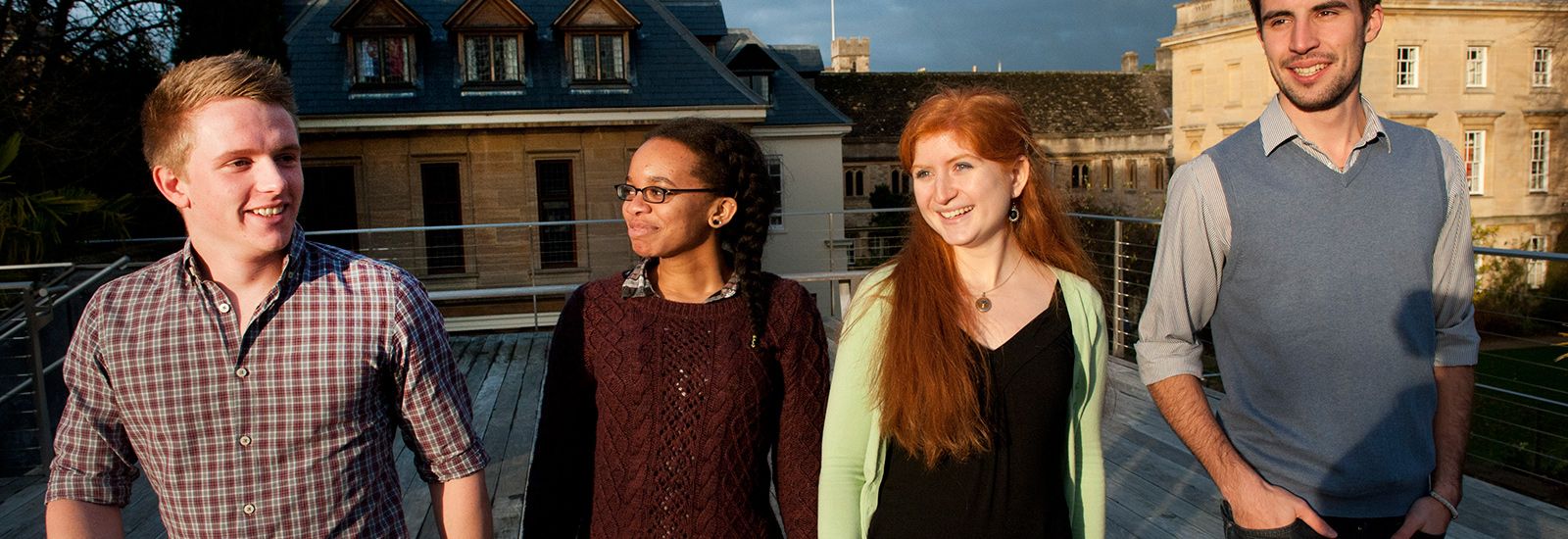Four students in the evening light
