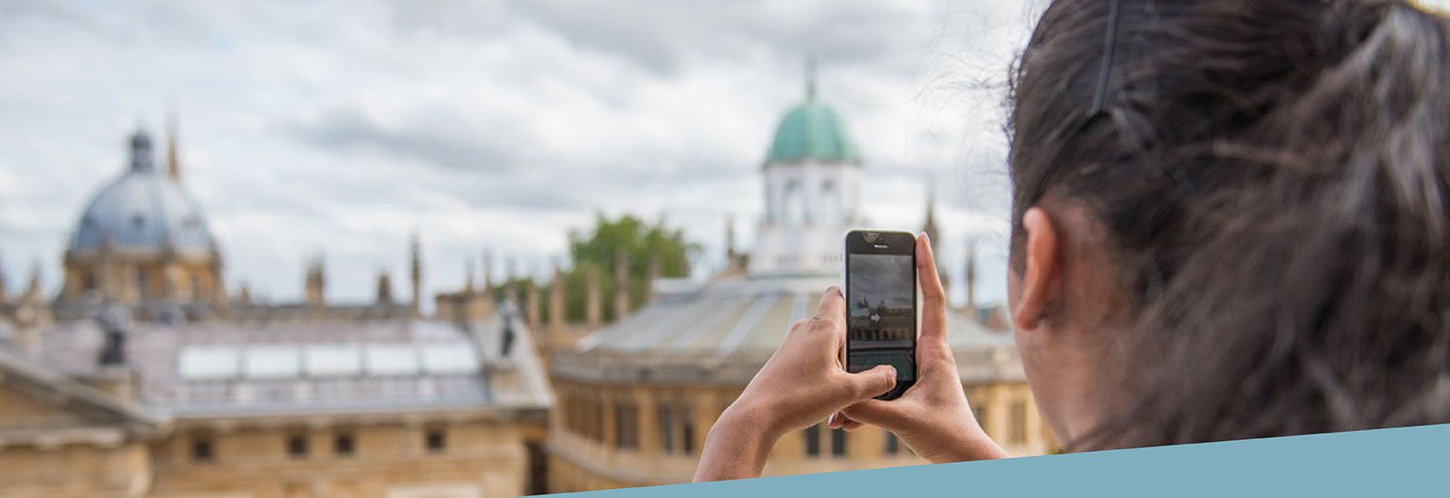 Student looking at Oxford skyline