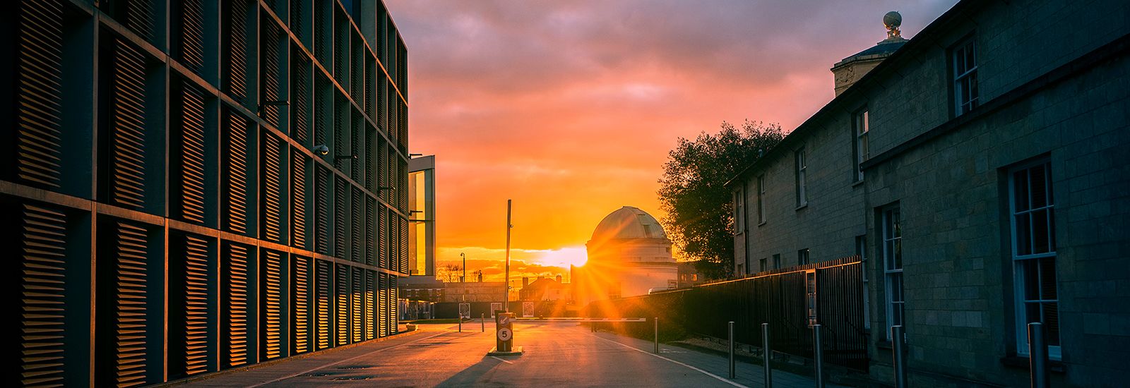 A sunset with the Maths Institute and Green Templeton College