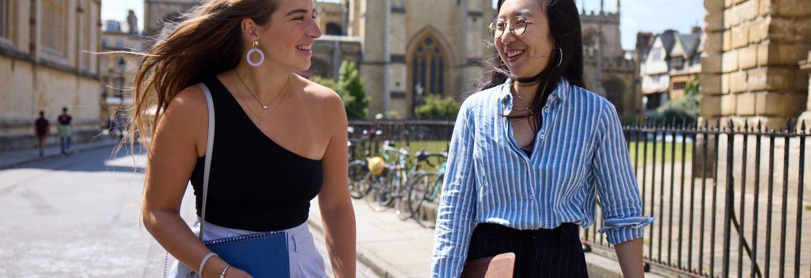 Two students walking through Radcliffe Square, Oxford. By Ian Wallman. 