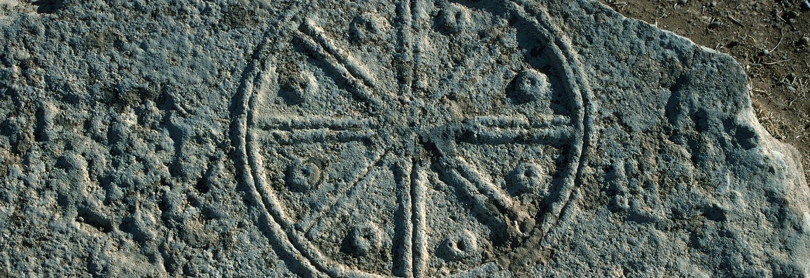 Carving of a Byzantine wheel in stone
