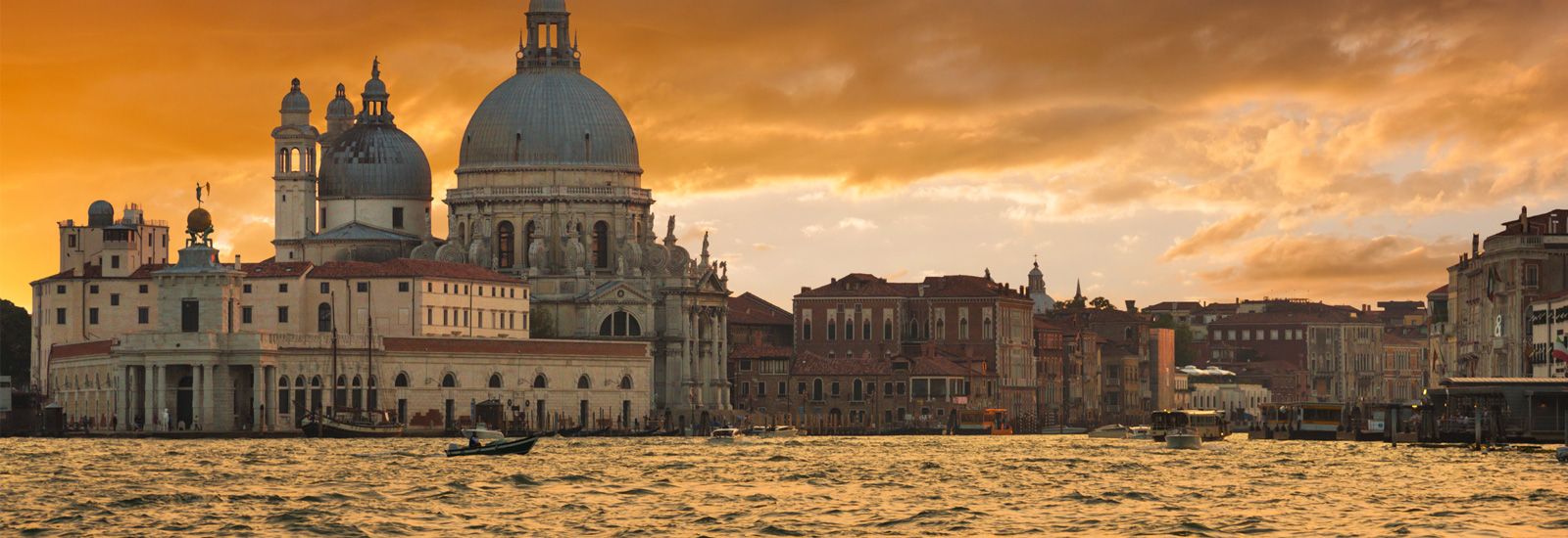 The Grand Canal and Basilica Santa Maria della Salute in Venice, Italy.