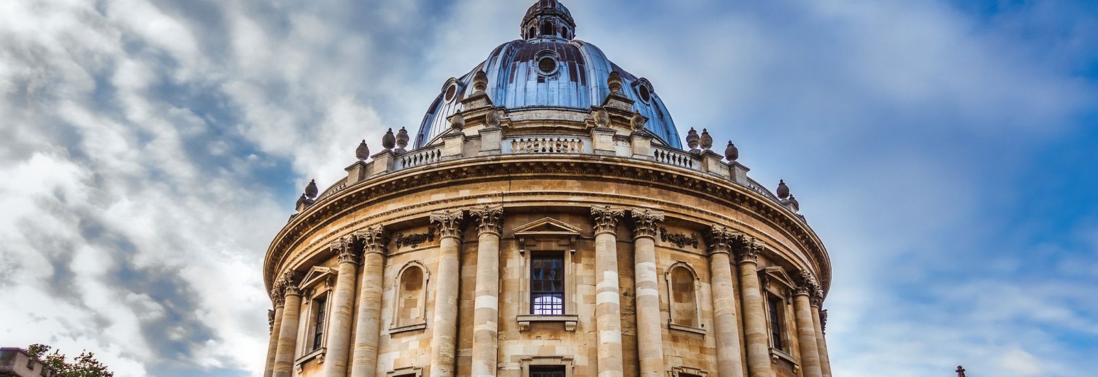 The Radcliffe Camera against a blue and cloudy sky