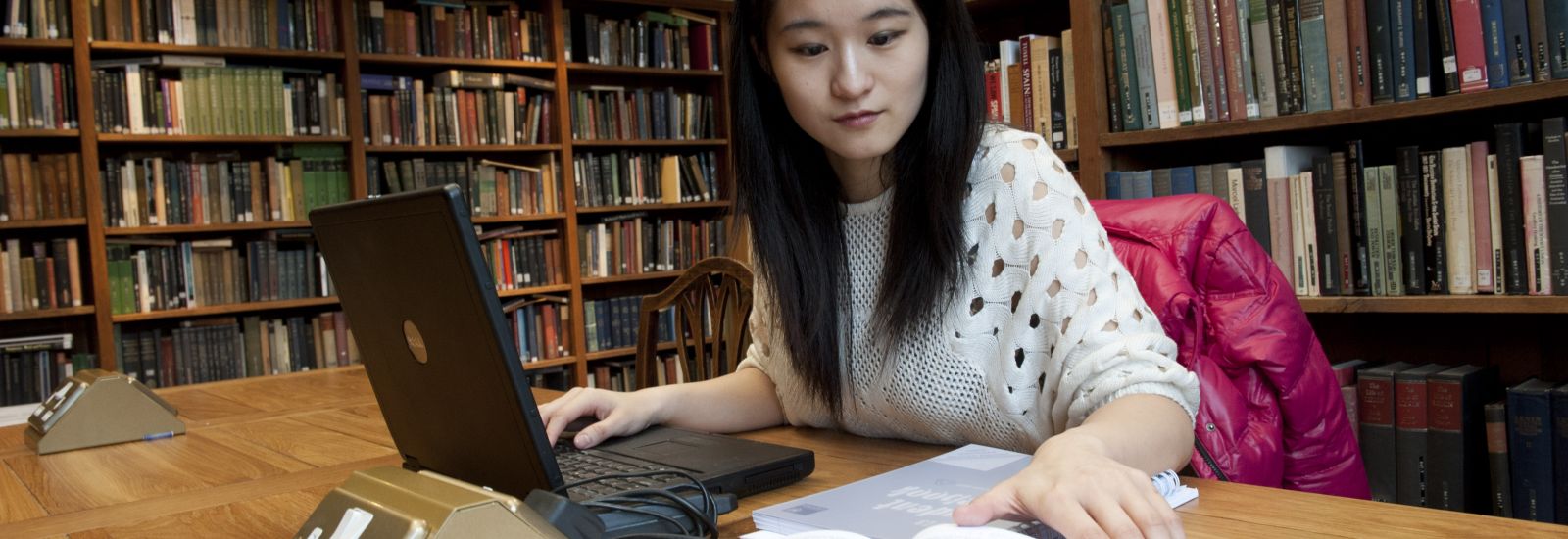 Student working in the library at Somerville College