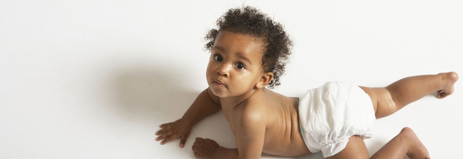 http://www.shutterstock.com/pic-144900370/stock-photo-high-angle-portrait-of-cute-baby-crawling-on-white-background.html?src=_LrYLXIUuJiuoCI-WAgq0g-1-7