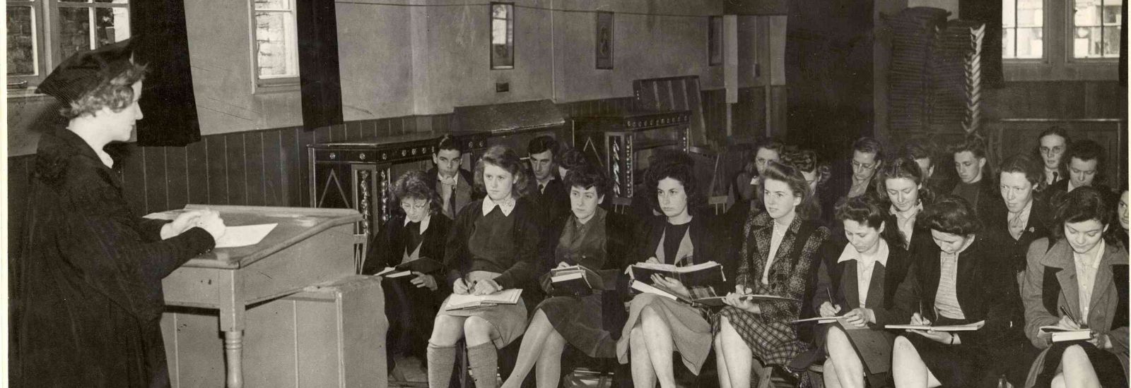 Enid Starkie, Fellow and Tutor in Modern Languages, gives a lecture in Somerville College in 1944