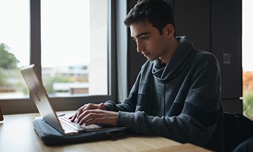 student at a computer