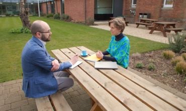 A career development review discussion between two people.