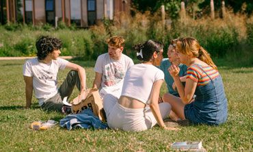 A group of students having a picnic 