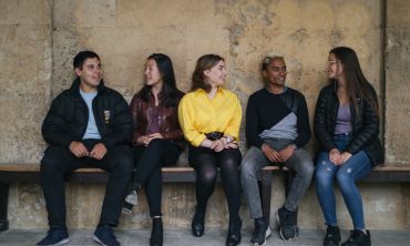 Students sitting on a bench