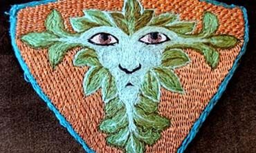 Green man embroidery 