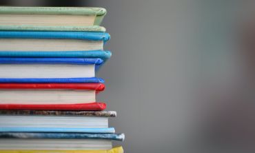 Stack of books with different coloured covers