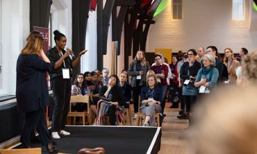 a group of people at a conference