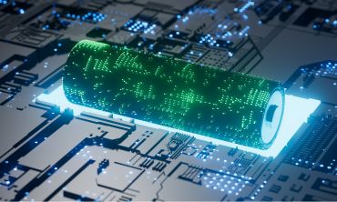 An artistic image of a glowing cylindrical battery lying on top of an electronic circuit board. Image credit: Shutterstock.