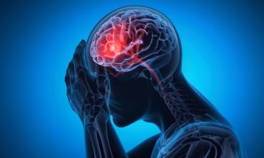Illustrative graphic seeing into a person’s head with their brain inflamed with pain signals. 