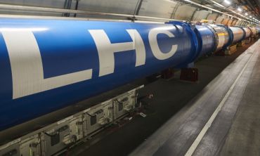 A chain of LHC dipole magnets inside the tunnel at point 1 (ATLAS)