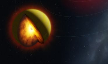 Artistic illustration showing a yellow planet illuminated by an out-of-shot sun, with a cut away revealing a core of glowing magma.