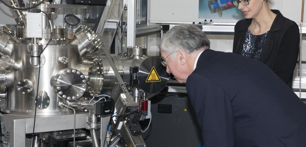 The pictures show Sir Michael Fallon inspecting a Pulsed Laser Deposition system in the Centre for Applied Superconductivity with Professor Susannah Speller from the Oxford University Materials Department.   Copyright: Crown copyright 2017