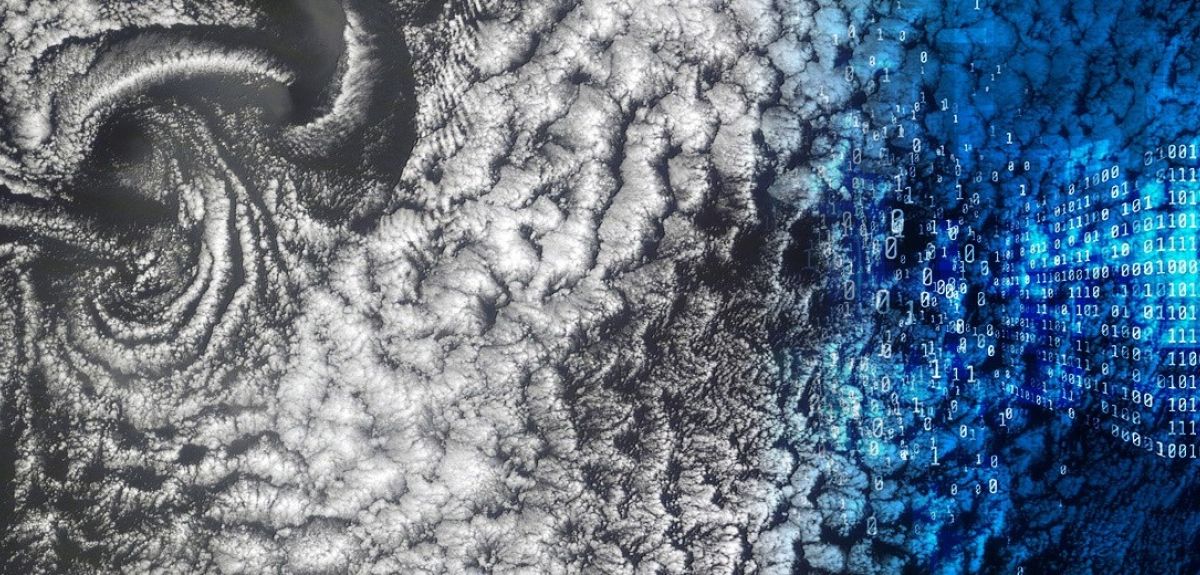 Artistic image showing an aerial view of cloud formations, with binary computing digits overlaid on top.