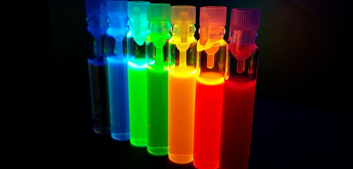 Glass tubes with quantum dots of perovskite nanocrystals, luminescing with all colours of the rainbow under ultraviolet radiation