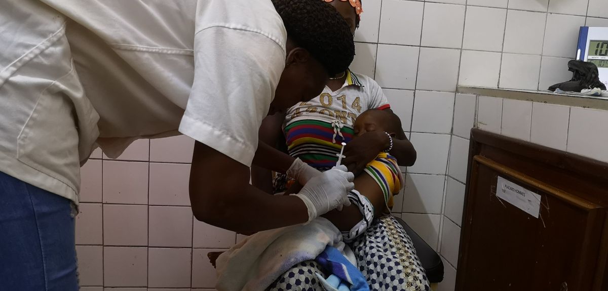 A child is vaccinated with the R21 malaria vaccine at Nanoro, Burkina Faso - credit Prof Katie Ewer