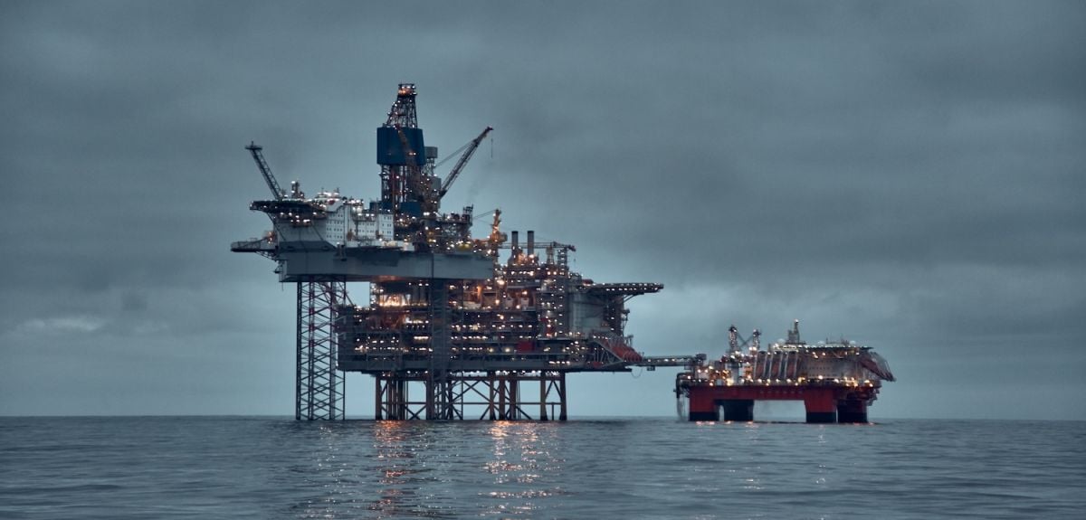 North Sea oil and gas platform in the sea at dusk. Credit: Igors Aleksejevs, Getty Images