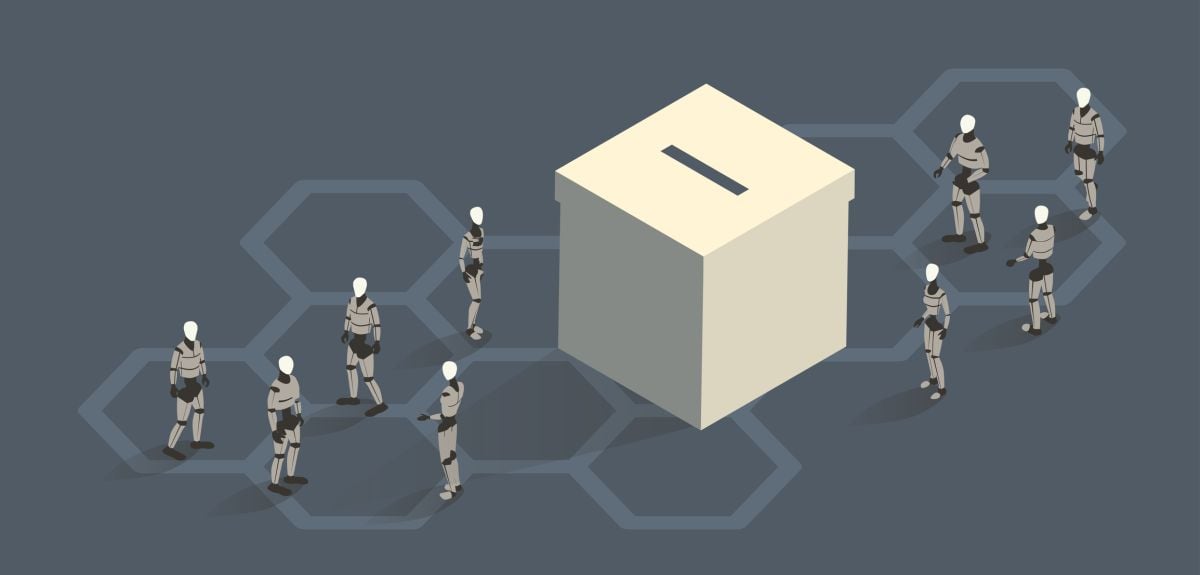 Illustration of a ballot box surrounded by robots. Credit: mathiswork, Getty Images