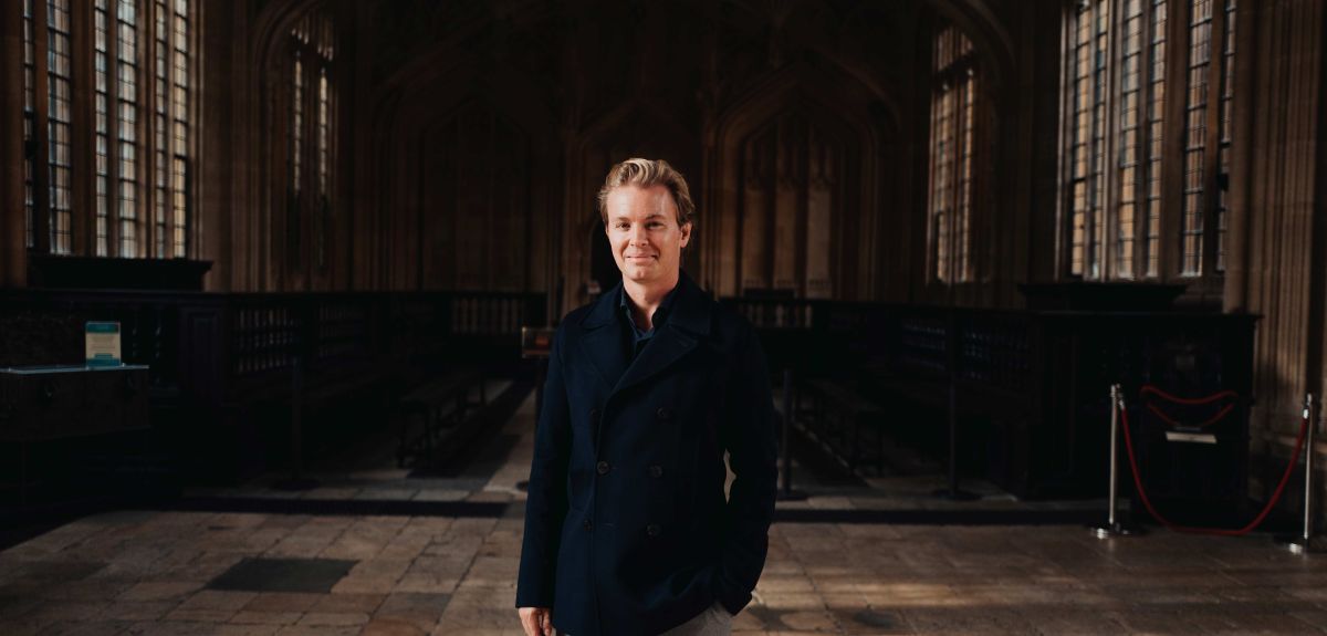 Image of Nico Rosberg standing in the Divinity School at Oxford University