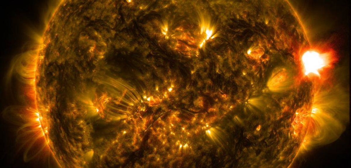 When the sun emits solar flares, intense activity increases radioactivity in the atmosphere which is detected in tree-rings. 