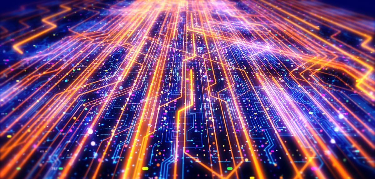 Technology concept with a circuit board background overlaid by glowing lines.