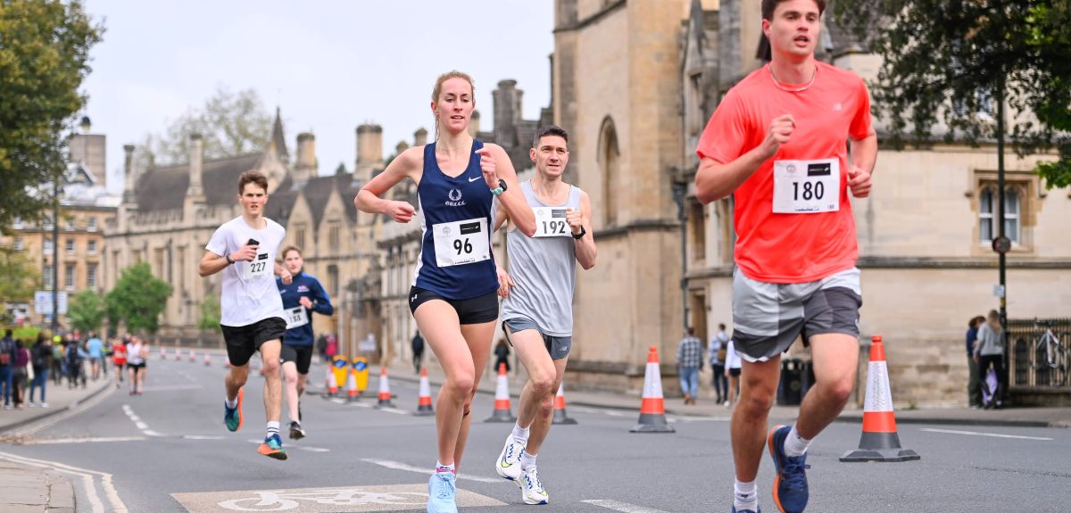 Runners taking part in the Bannister Community Mile through the streets of Oxford