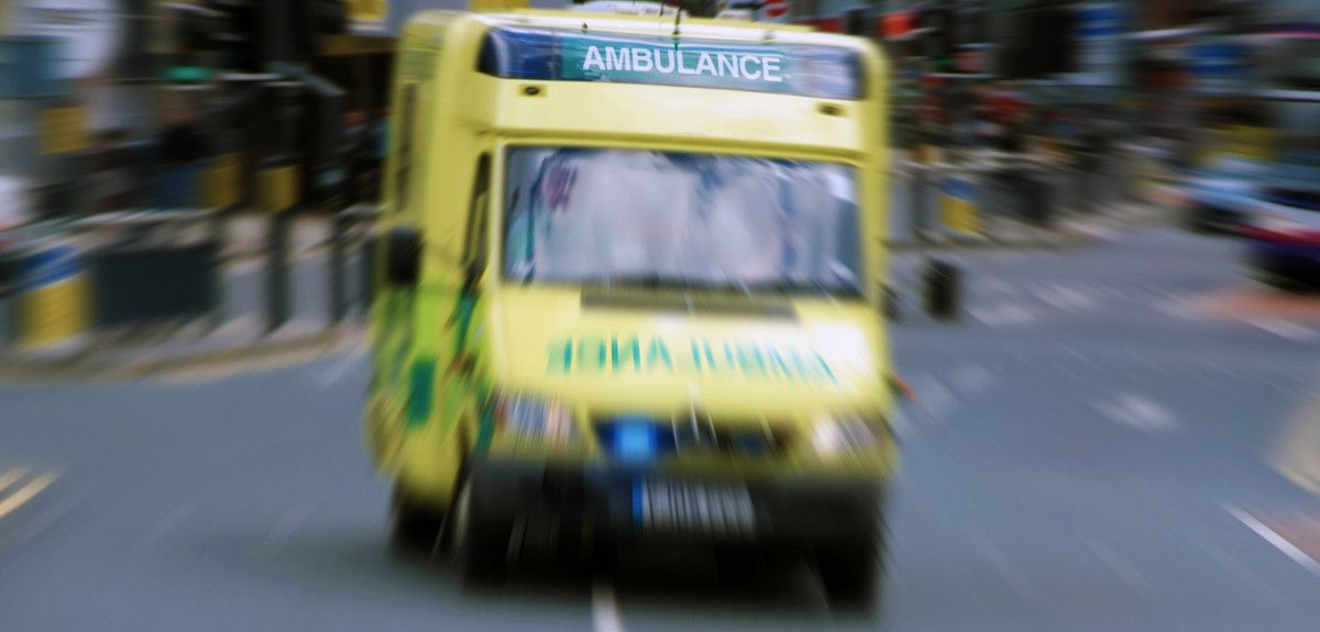 Ambulance racing through a street