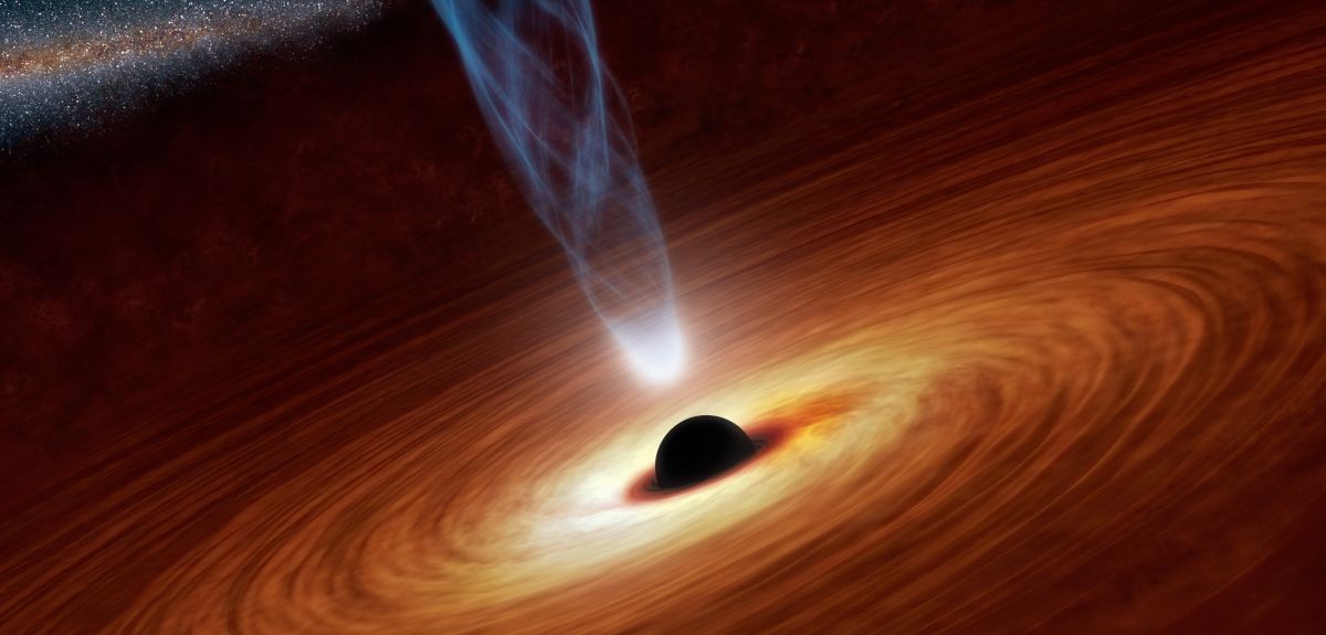 Artist's concept illustrates a supermassive black hole with millions to billions times the mass of our sun