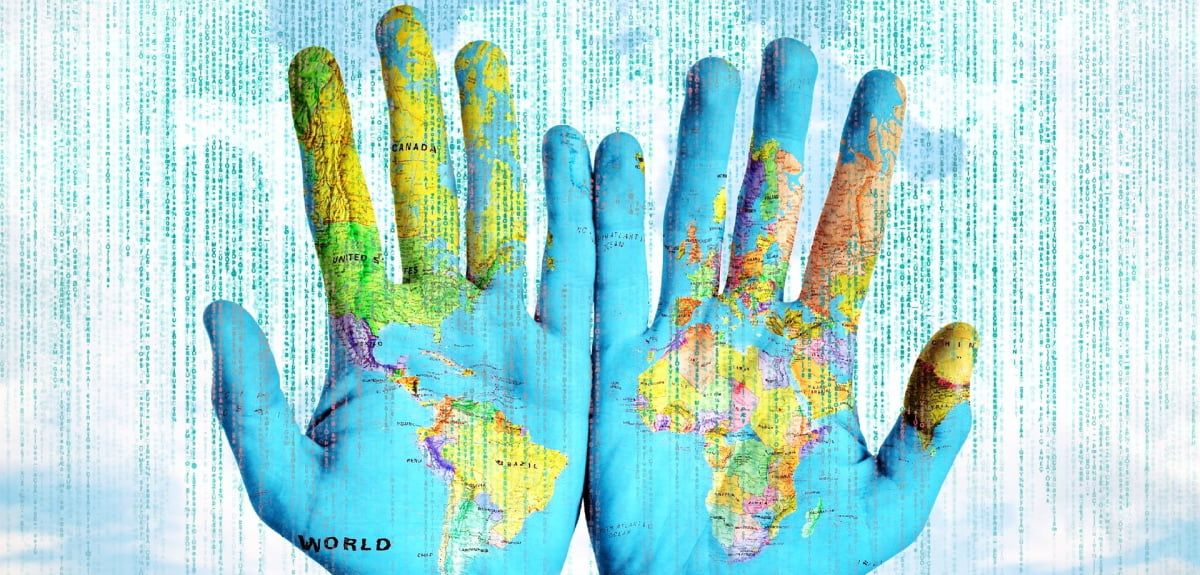 The world map on a pair of hands